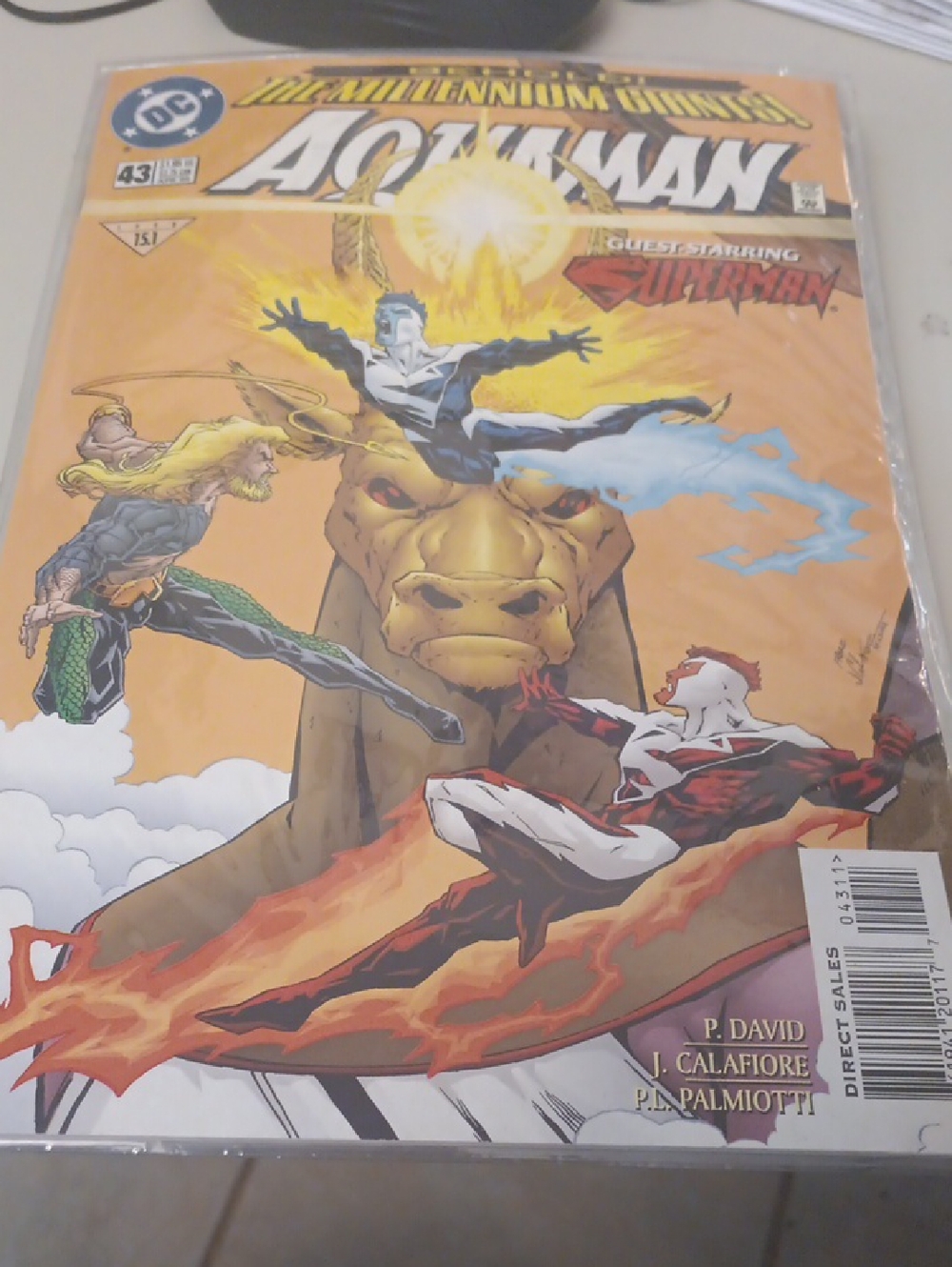 DC Aquaman Comic with Orange Cover and Multicolor Characters In A Sleeve